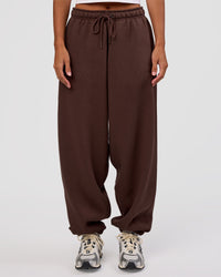 Woman wearing MVP Oversized Slouchy Fit Track Pant - Hot Chocolate | Model:Brylee | Size:S