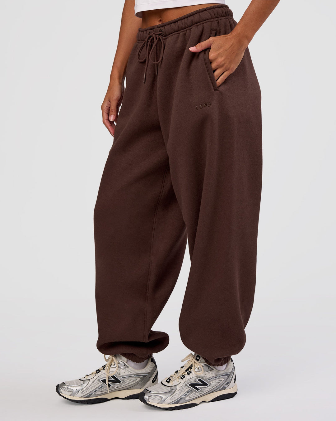 Woman wearing MVP Oversized Slouchy Fit Track Pant - Hot Chocolate | Model:Brylee | Size:S