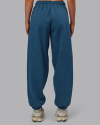 Woman wearing MVP Oversized Slouchy Fit Track Pant - Indigo | Model:Paris | Size:S | Thumbnail Index: 3