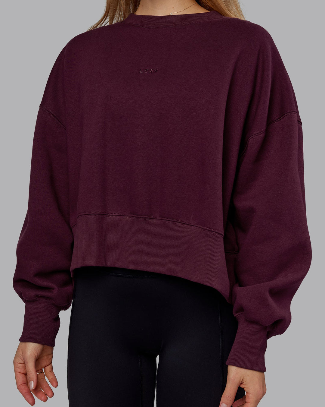 Woman wearing MVP Oversized Sweater - Cherry Lacquer | Model:Emilie | Size:S