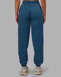 Woman wearing MVP Track Pant - Indigo | Model:Paris | Size:S