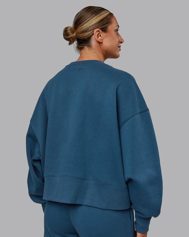 Woman wearing MVP V Neck Oversized Sweater - Indigo | Model:Paris | Size:S
