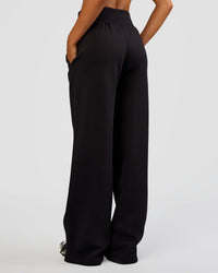 Woman wearing MVP Wide Leg Tall Track Pant - Black | Model:Ruby | Size:S | Thumbnail Index: 3
