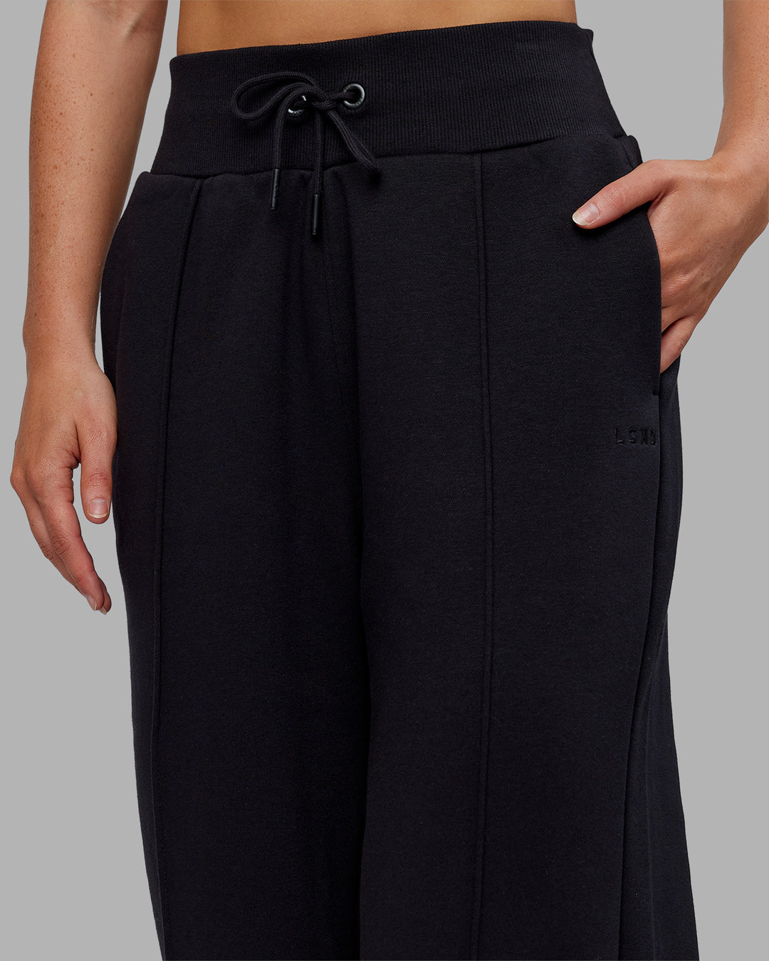 Woman wearing MVP Wide Leg Joggers - Black | Model:Neve | Size:S