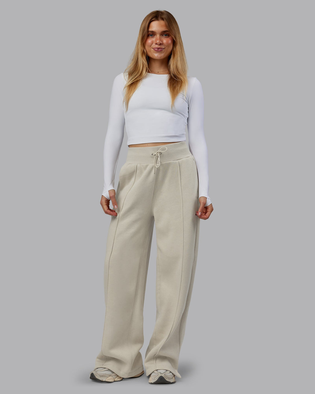 Woman wearing MVP Wide Leg Track Pant - Shale Beige | Model:Emilie | Size:S
