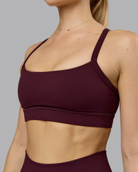 Woman wearing Momentum Sports Bra - Cherry Lacquer | Model:Emilie | Size:S | Thumbnail Index: 6