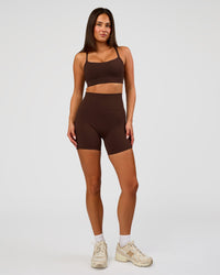 Woman wearing Momentum Sports Bra D/DD/E - Hot Chocolate | Model:Bianca | Size:S
