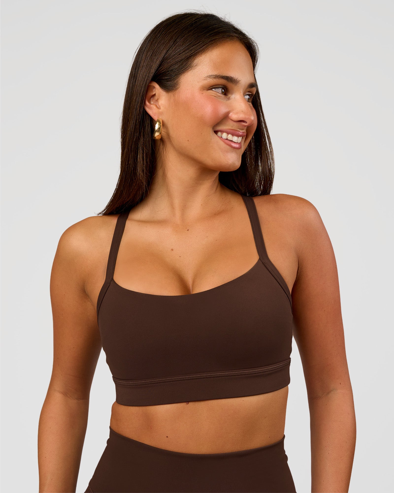Woman wearing Momentum Sports Bra D/DD/E - Hot Chocolate | Model:Bianca | Size:S