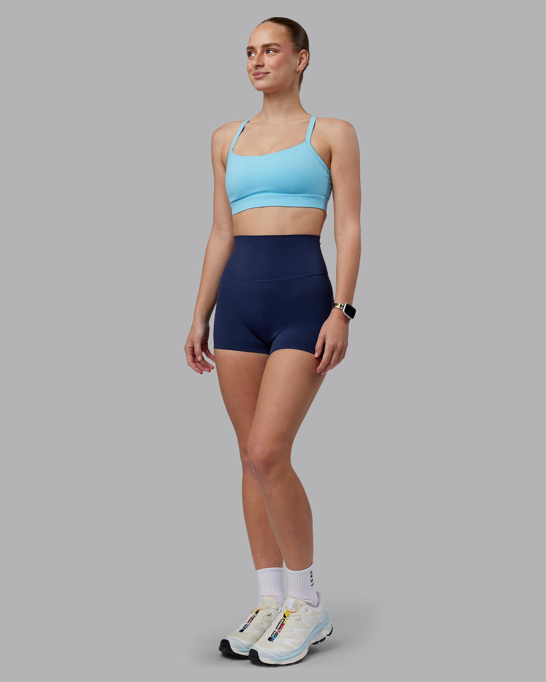 Woman wearing Momentum Sports Bra D/DD/E - Sky Blue | Model:Lillie | Size:S