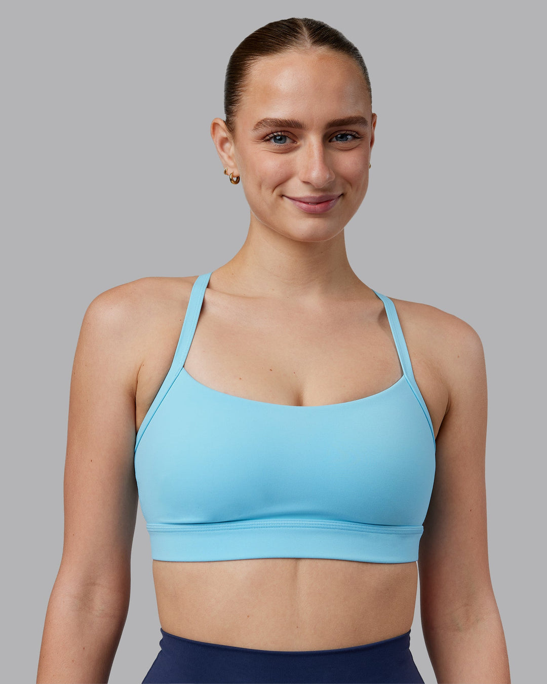 Woman wearing Momentum Sports Bra D/DD/E - Sky Blue | Model:Lillie | Size:S