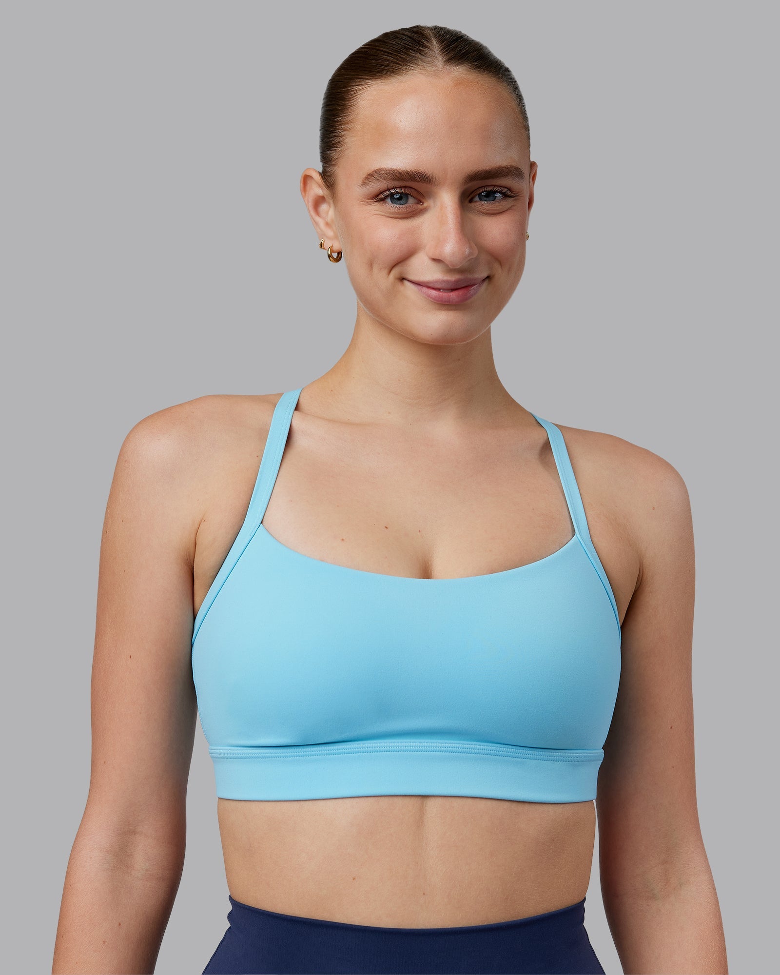 Woman wearing Momentum Sports Bra D/DD/E - Sky Blue | Model:Lillie | Size:S