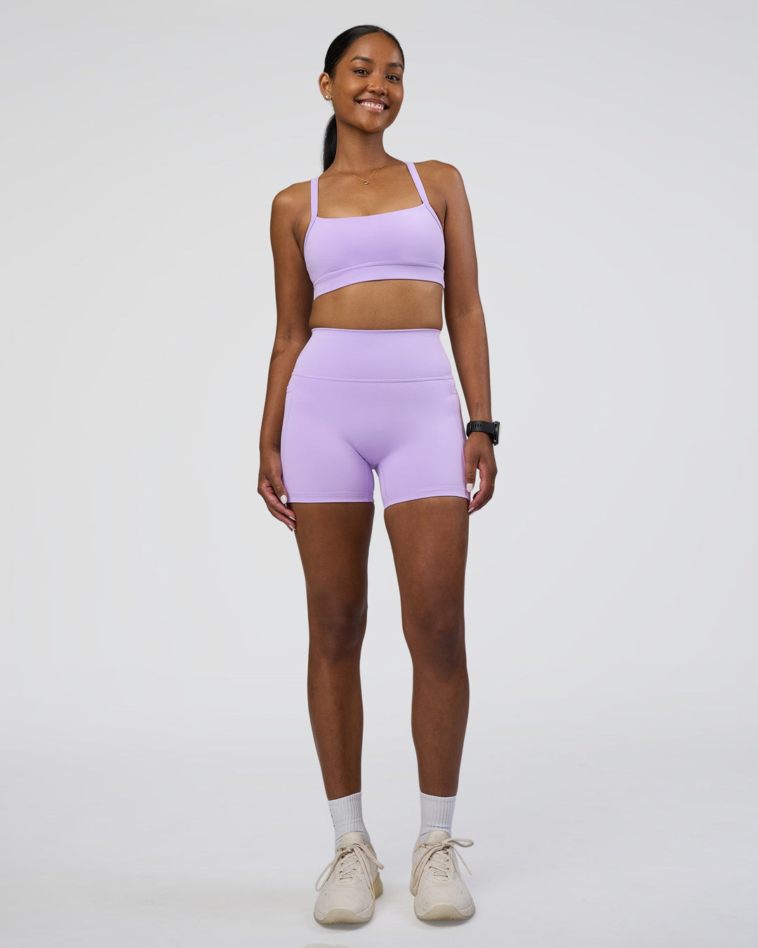 Woman wearing Momentum Sports Bra - Pale Lilac | Model:Rica | Size:S