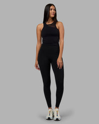 Woman wearing Motion Mesh Shelf Bra Tank - Black | Model:Rhiley | Size:S | Thumbnail Index: 4