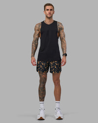 Man wearing Pace 5" Lined Running Short - Markings Black Print | Model:Tommy | Size:S