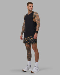 Man wearing Pace 5" Lined Running Short - Markings Black Print | Model:Tommy | Size:S