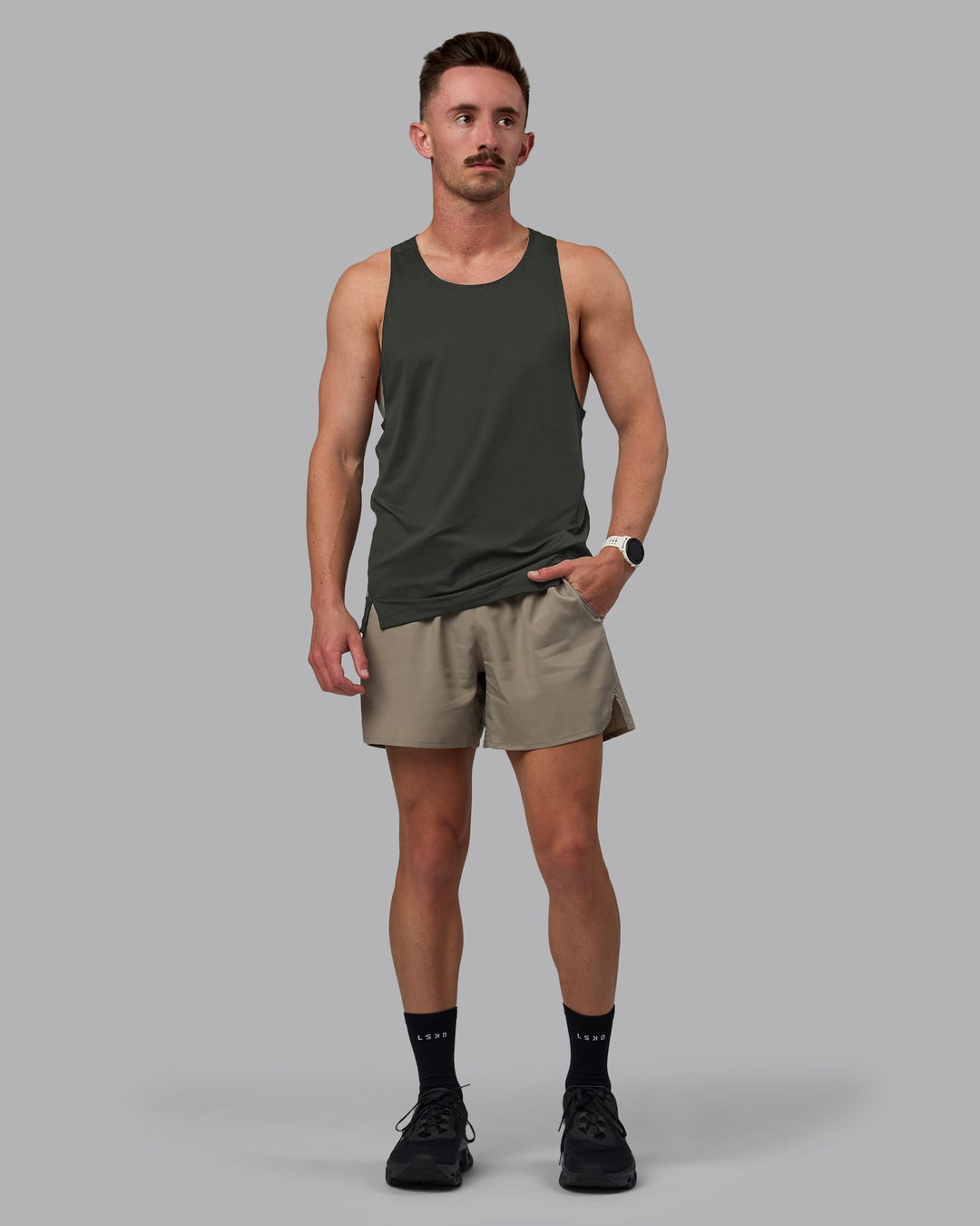 Man wearing Pace Running Tank - Pirate Black