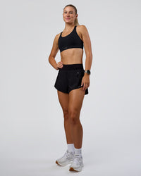 Woman wearing Pacer 3" Run Short - Black | Model:Emelia | Size:S