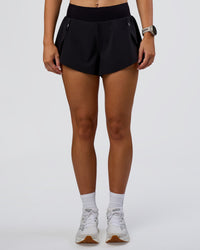 Woman wearing Pacer 3" Run Short - Black | Model:Emelia | Size:S