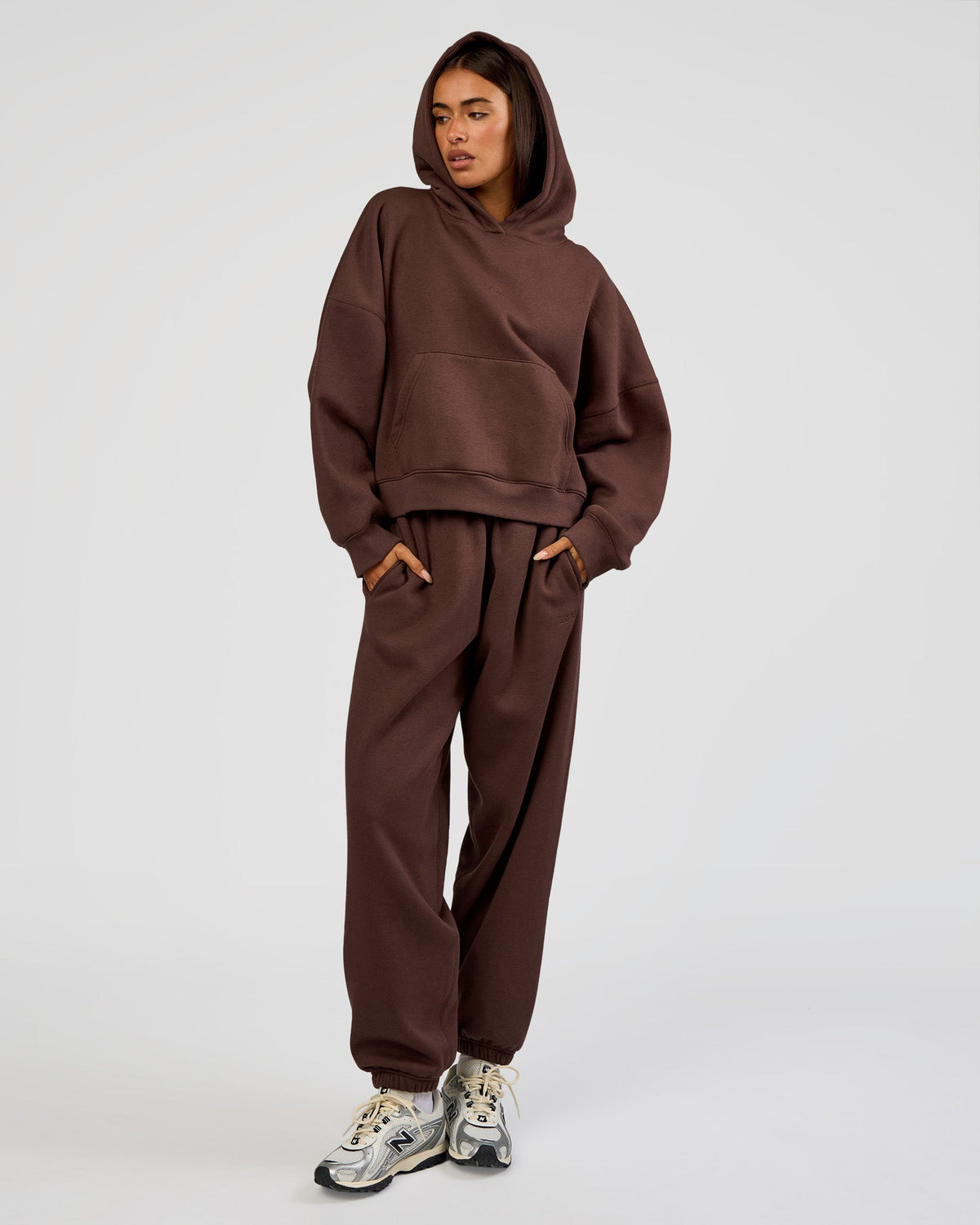 Woman wearing Post Train Hoodie - Hot Chocolate | Model:Ruby | Size:S - view 2