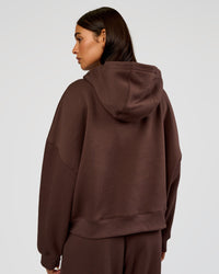 Woman wearing Post Train Hoodie - Hot Chocolate | Model:Ruby | Size:S | Thumbnail Index: 2