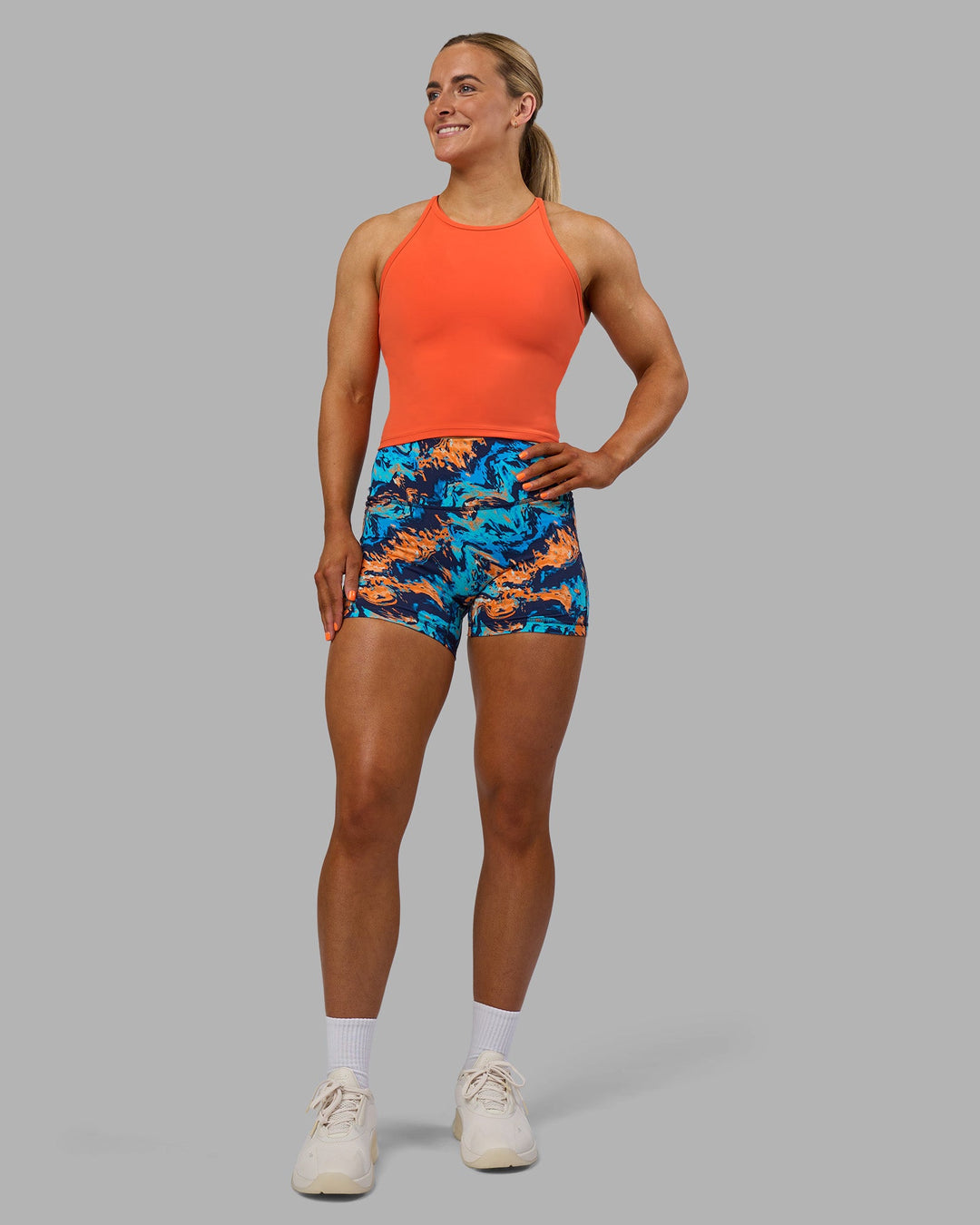 Woman wearing Power Performance Tank - Ultra Orange | Model:Georgia | Size:S