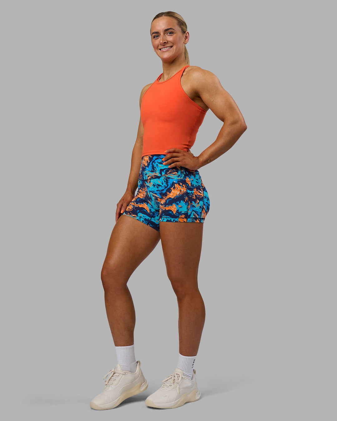 Woman wearing Power Performance Tank - Ultra Orange | Model:Georgia | Size:S