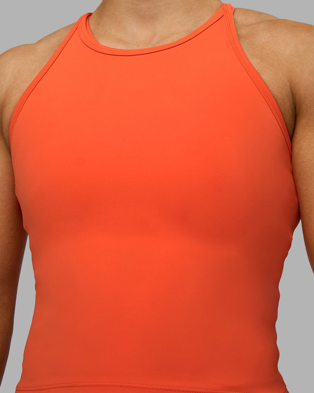 Woman wearing Power Performance Tank - Ultra Orange | Model:Georgia | Size:S