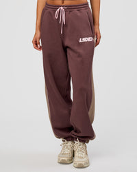Woman wearing Power Play Stitch Up Fleece Sweat Pant - Cocoa Powder-Marshmallow | Model:Bianca | Size:S