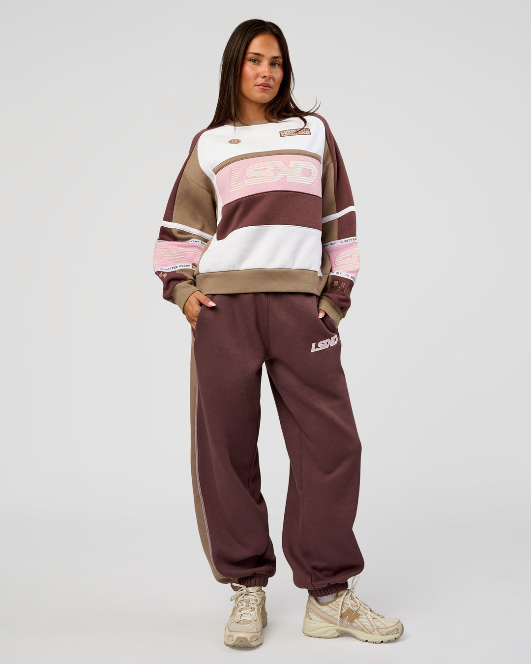 Woman wearing Power Play Stitch Up Fleece Sweat Pant - Cocoa Powder-Marshmallow | Model:Bianca | Size:S