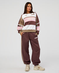 Woman wearing Power Play Stitch Up Fleece Sweat Pant - Cocoa Powder-Marshmallow | Model:Bianca | Size:S