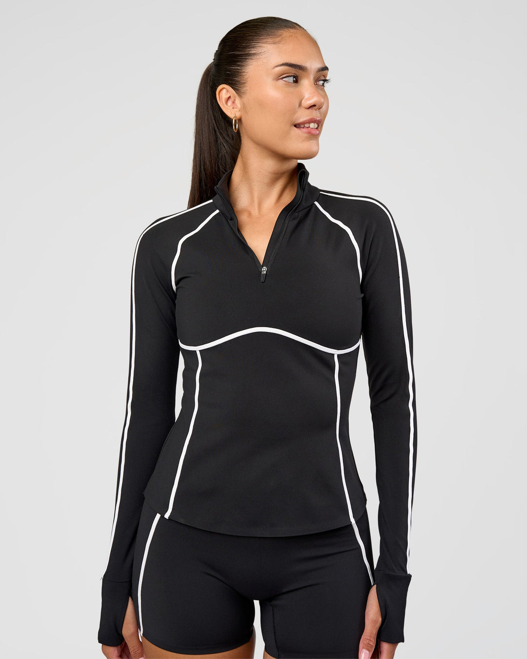 Woman wearing Power Quarter Zip Jacket - Black | Model:Rhiley | Size:S - view 7