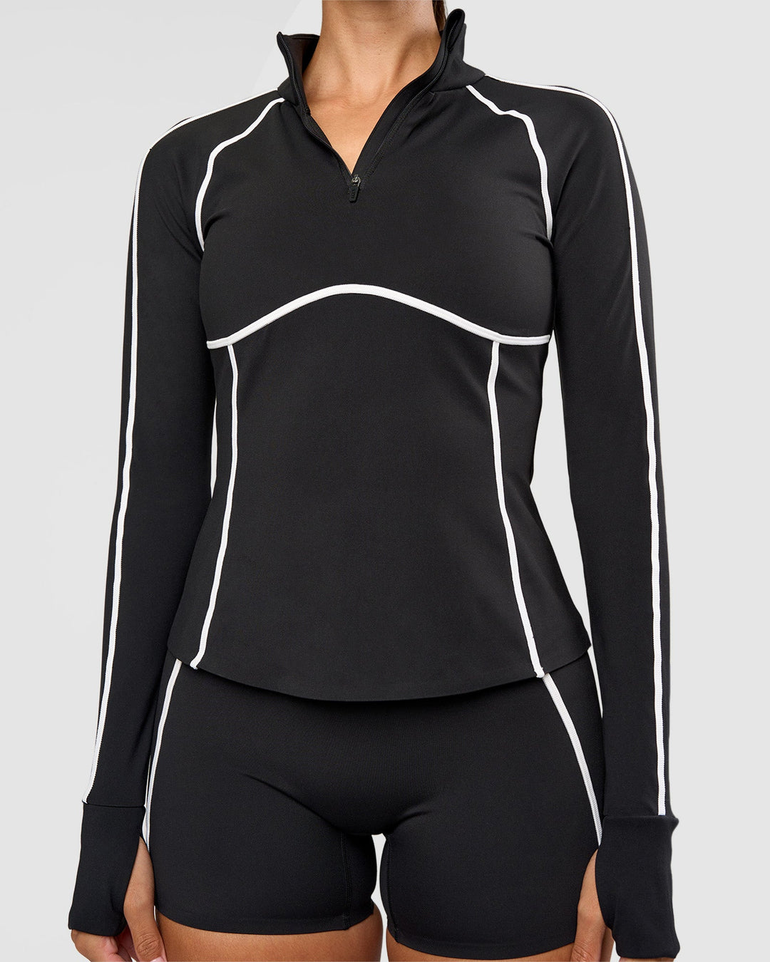 Woman wearing Power Quarter Zip Jacket - Black | Model:Rhiley | Size:S - view 8