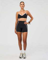 Woman wearing Power Sweetheart Sports Bra - Black | Model:Rhiley | Size:S