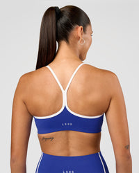 Woman wearing Power Sweetheart Sports Bra - Electric Indigo | Model:Charli | Size:XS | Thumbnail Index: 7