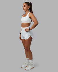 Woman wearing Power Train 2" Short in White | Model:Tylah | Size:S