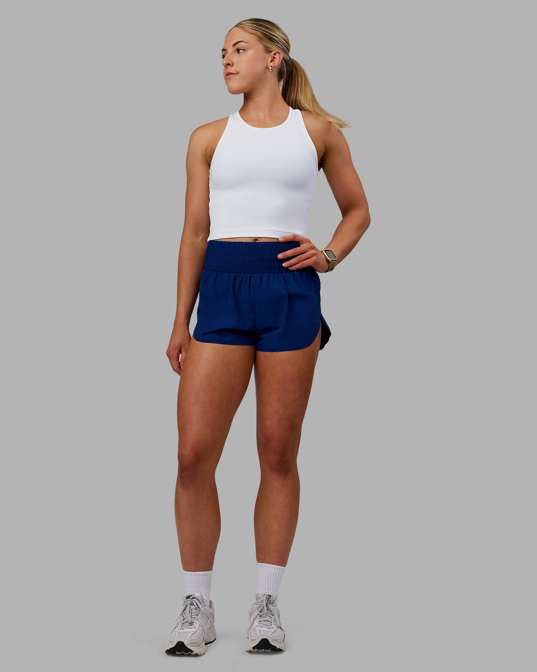 Woman wearing Power Train Shorts - Midnight Blue