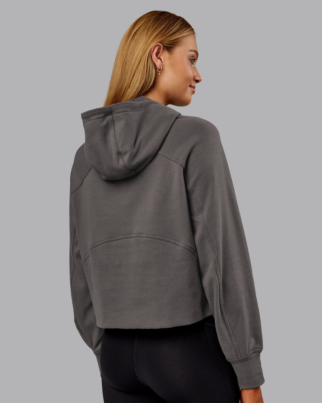 Woman wearing Pursue Mid-Weight Hoodie - Dark Storm | Model:Ella | Size:S