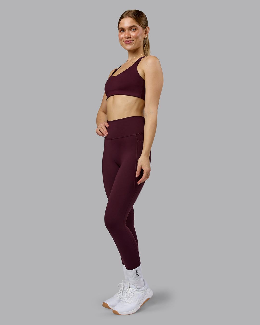 Woman wearing Push The Limit Sports Bra - Cherry Lacquer  Model:Emilie | Size:S