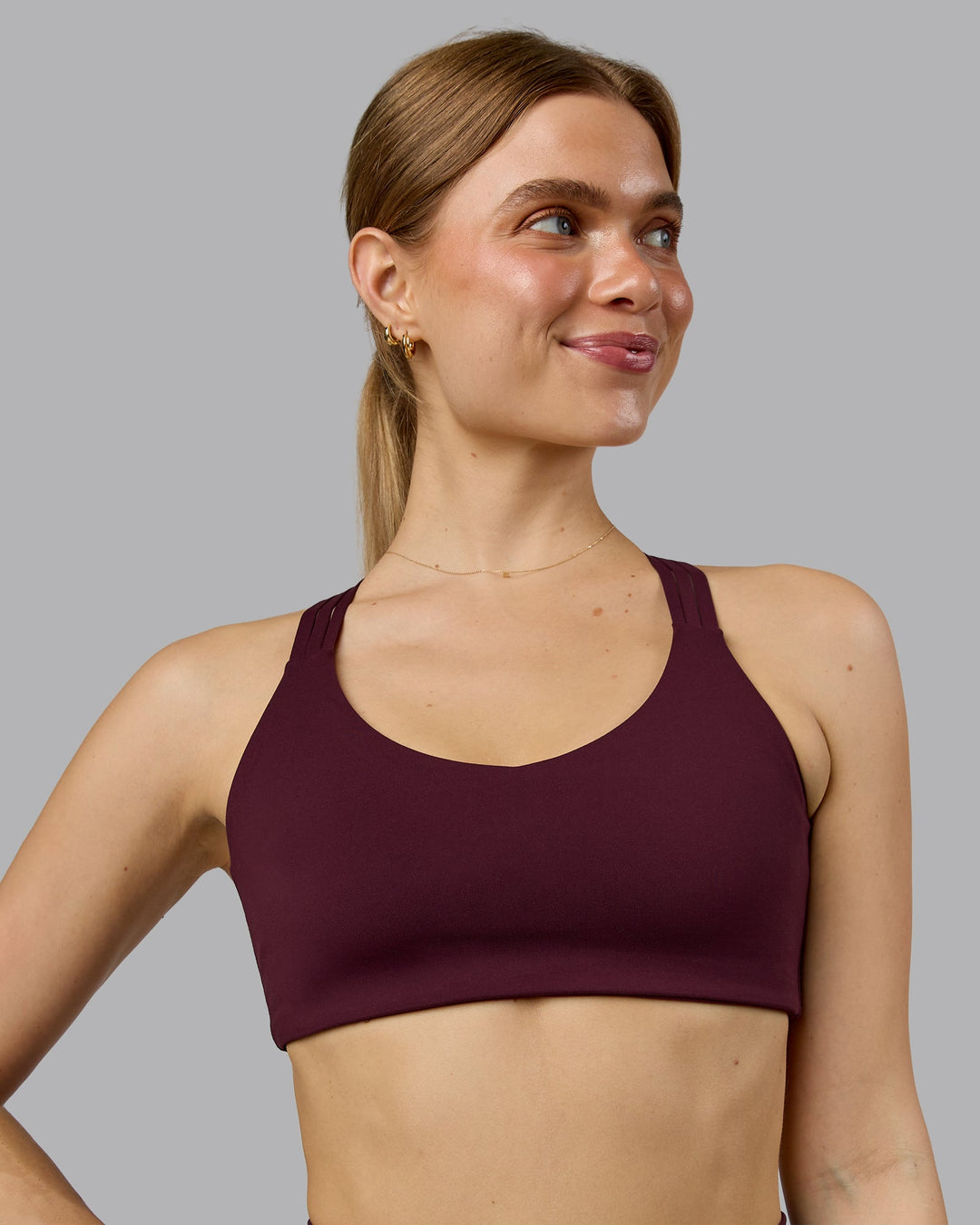 Woman wearing Push The Limit Sports Bra - Cherry Lacquer  Model:Emilie | Size:S