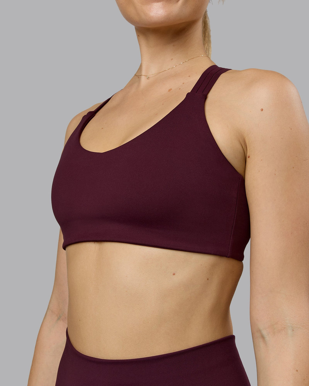 Woman wearing Push The Limit Sports Bra - Cherry Lacquer  Model:Emilie | Size:S