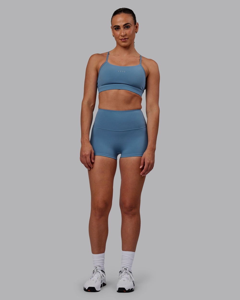 Woman wearing RXD High Waist Micro Shorts - Elemental Blue