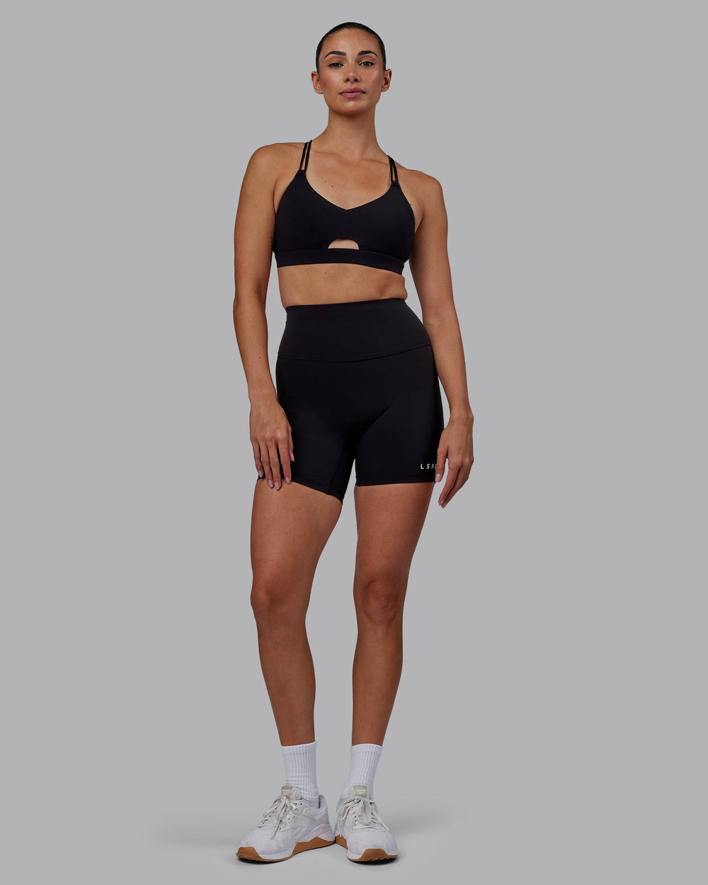 Woman wearing RXD High Waist Mid-Length Shorts - Black