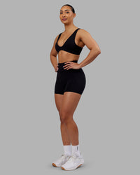 Woman wearing Reform Sports Bra - Black | Model:Ayla | Size:S | Thumbnail Index: 4