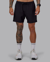Man wearing Rep 5" Lined Performance Shorts in Black | Size:S | Thumbnail Index: 1
