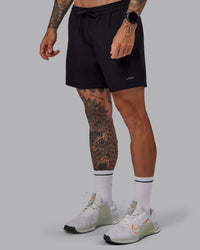 Man wearing Rep 5" Lined Performance Shorts in Black | Size:S | Thumbnail Index: 5