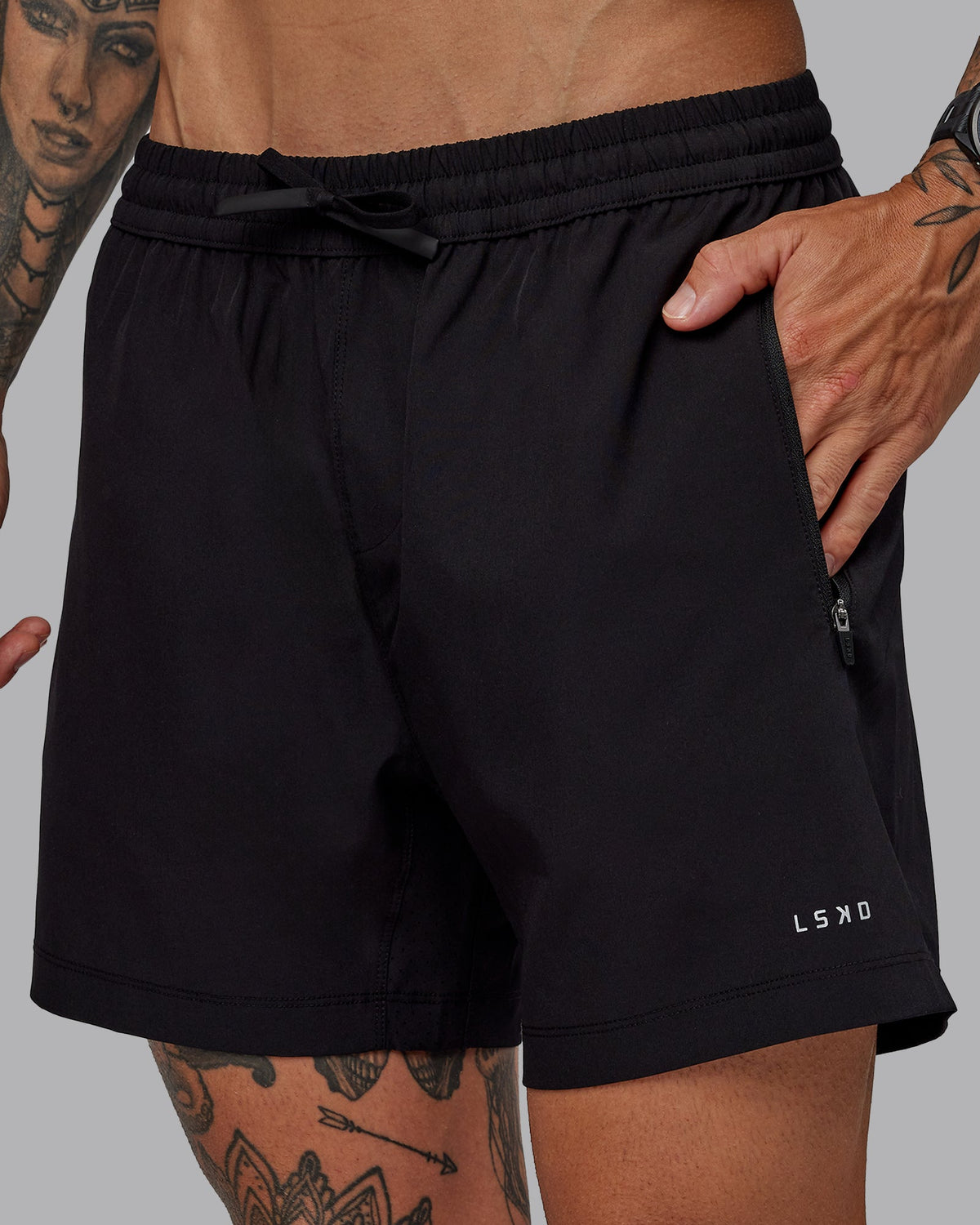 Man wearing Rep 5" Lined Performance Shorts in Black | Size:S - view 1
