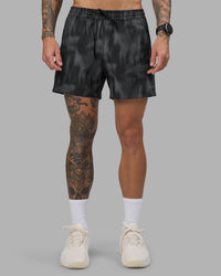 Man wearing Rep 5" Performance Short - Lunar Glow Print | Model:Tommy | Size:S