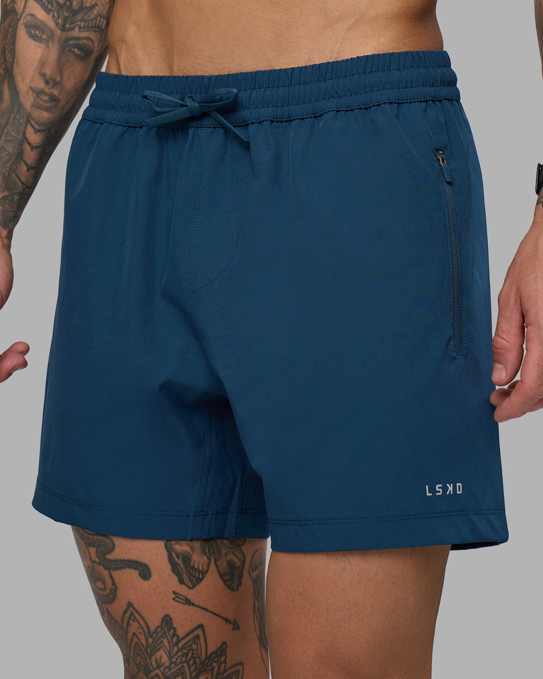Man wearing Rep 5&quot; Performance Short - Night Sea | Model:Tommy | Size:S