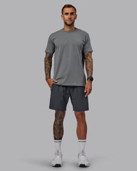 Man wearing Rep 7'' Performance Short in Dark Storm | Size:S