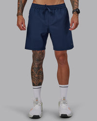 Man wearing Rep 7'' Performance Short in Future Navy | Size:S
